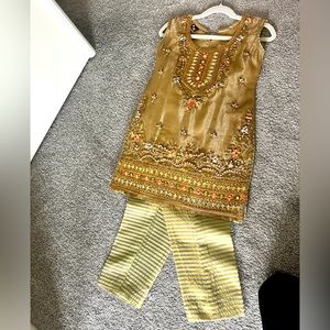 Beautiful golden pakistani outfit